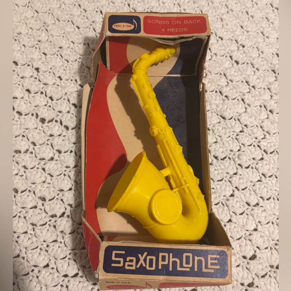 Vintage Proll-o-tone Bright Yellow Kids Saxophone Toy in box no-122
